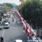  Komunitas Irama Jalan Kaki atau Irjaki Wonosobo arak bendera Merah Putih sepanjang 100 meter pada Rabu (19/8/2026).